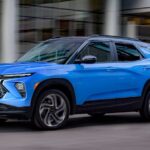 A blue 2025 Chevy Trailblazer for sale is shown from the front at an angle.
