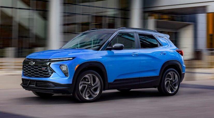 A blue 2025 Chevy Trailblazer for sale is shown from the front at an angle.