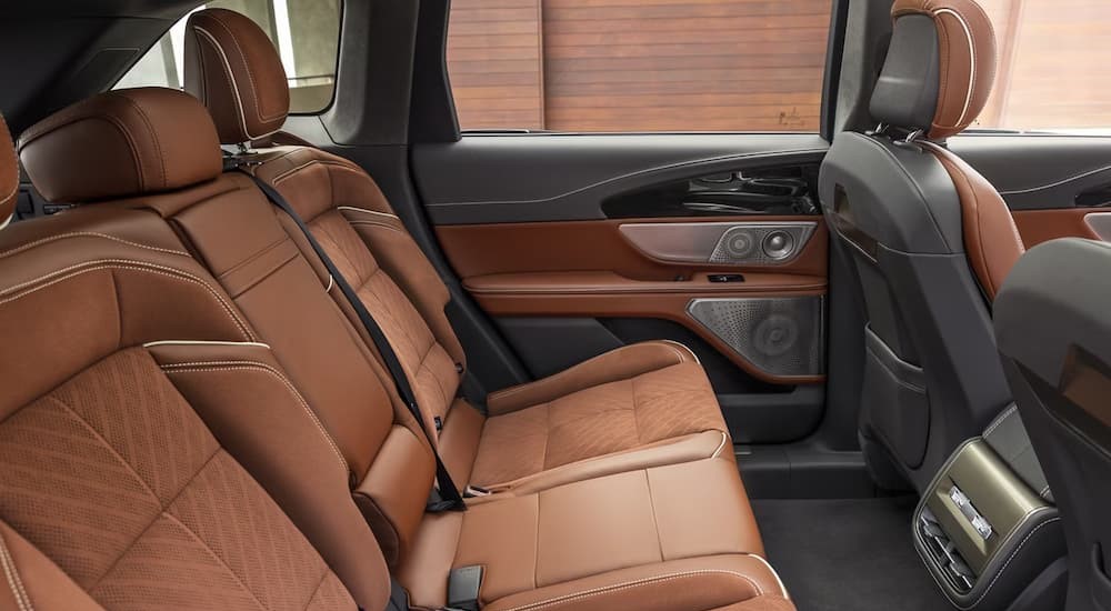 The gray and brown rear interior in a 2025 Lincoln Nautilus is shown.