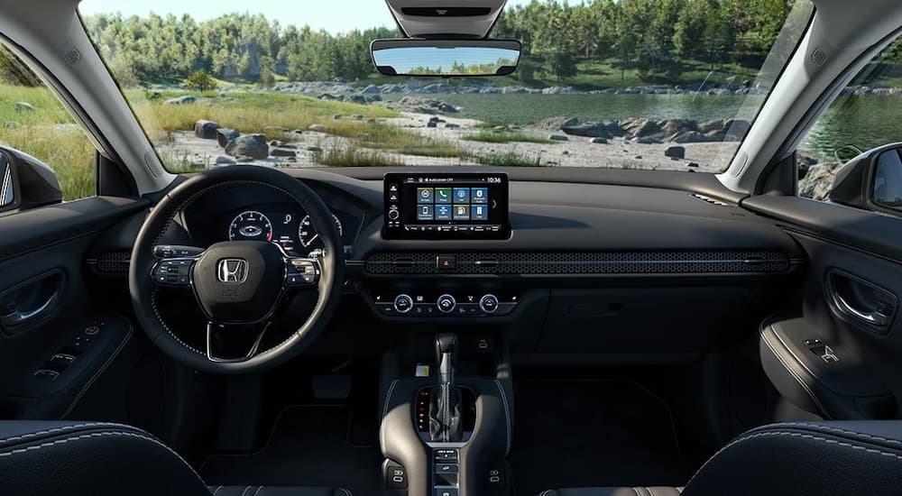 The black interior of a 2025 Honda HR-V is shown from above the center console.