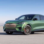 A green 2024 Ford Mustang Mach-E GT is shown from the side.
