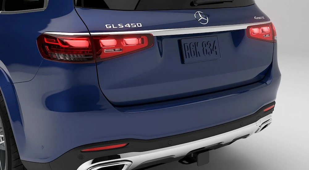 A close-up of the hatch on a blue 2024 Mercedes-Benz GLS450 is shown.