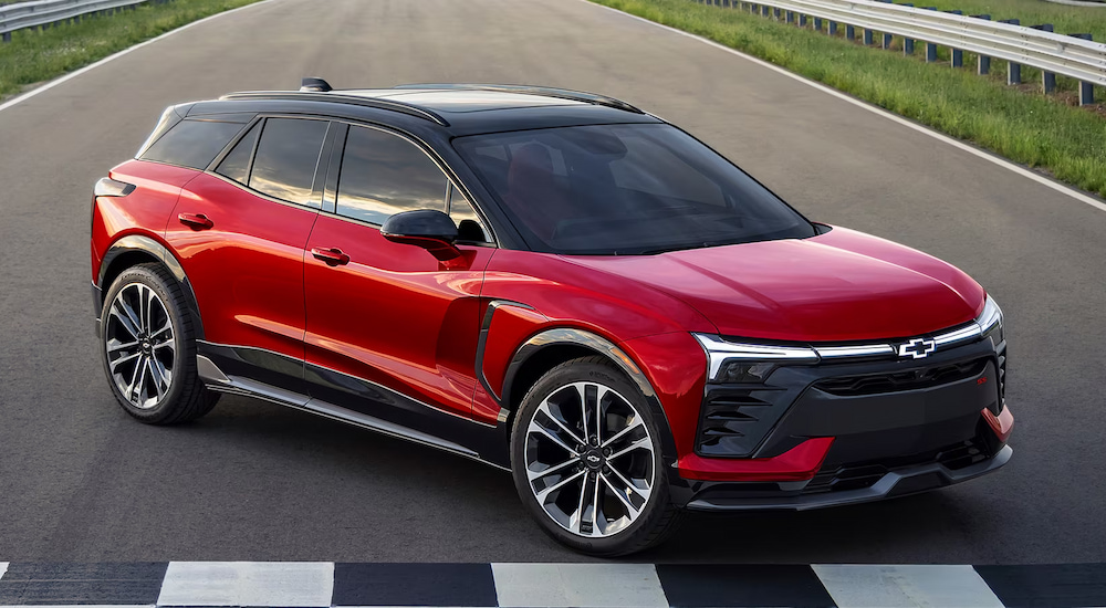 A red 2024 Chevy Blazer EV SS parked on a racetrack.