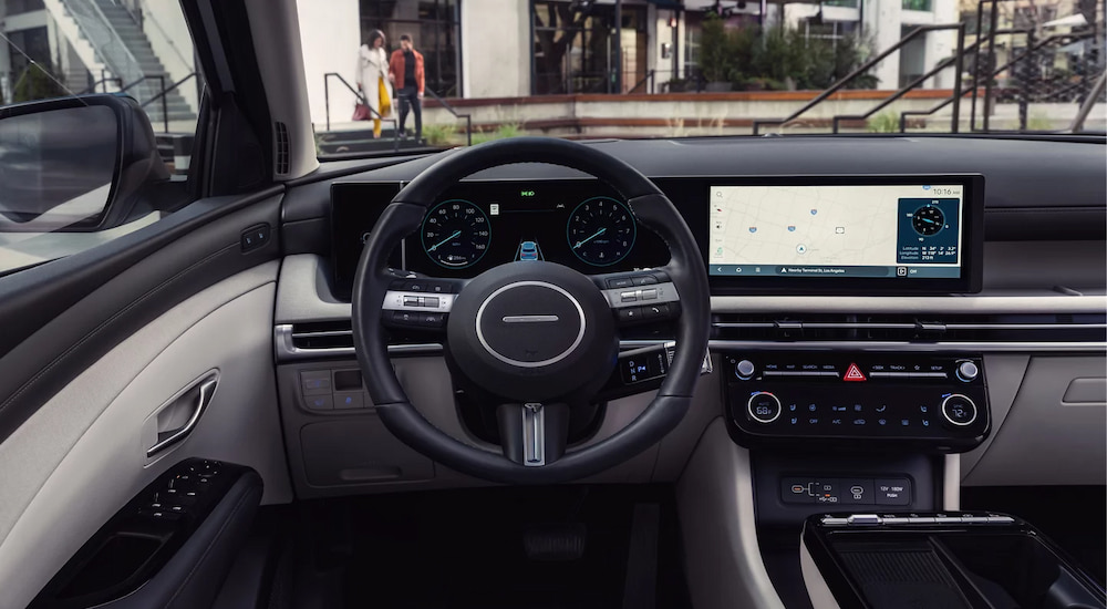 The steering wheel, digital instrument cluster and infotainment screen in a 2025 Hyundai Tucson.