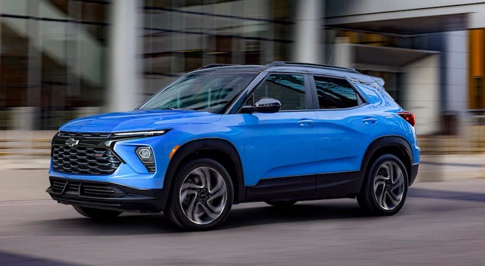 A blue 2024 Chevy Trailblazer RS is shown from the side.