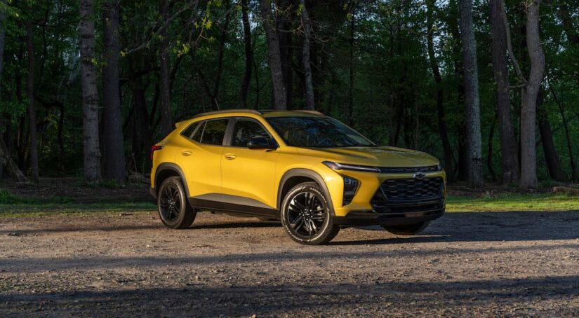 A yellow 2024 Chevy Trax ACTIV is shown from the front at an angle after leaving a Chevy dealer.