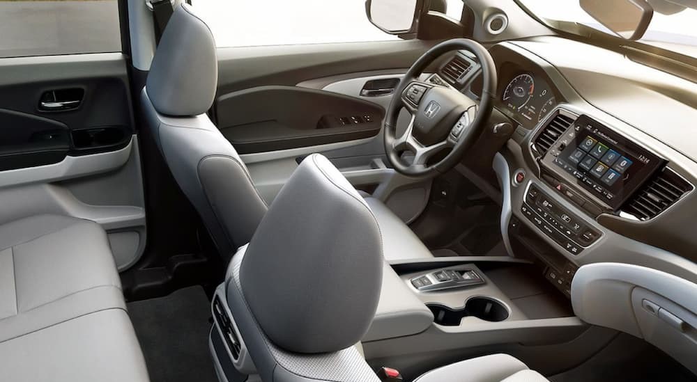 The gray and black interior and dash is shown in a 2025 Honda Ridgeline.