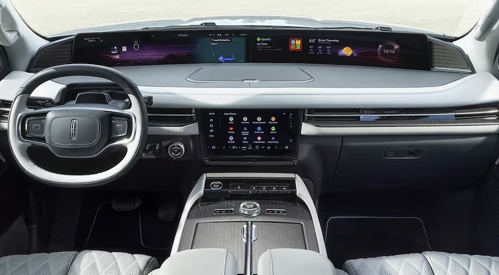 The white and gray interior and dash is shown in a 2025 Lincoln Navigator.