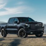 A black 2025 Chevy Silverado 1500 High Country Black Edition is shown parked after visiting a Chevy dealer near me.
