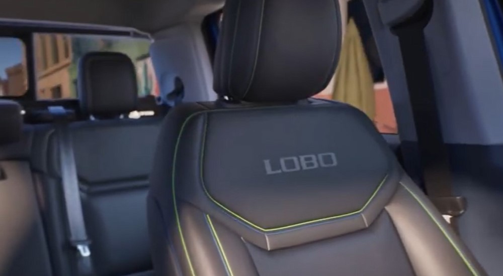 A close-up of the gray interior is shown in a 2025 Ford Maverick LOBO.