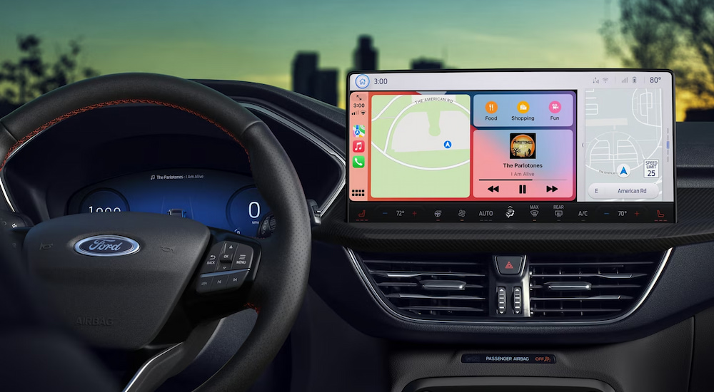 The steering wheel and infotainment screen in a 2025 Ford Escape.