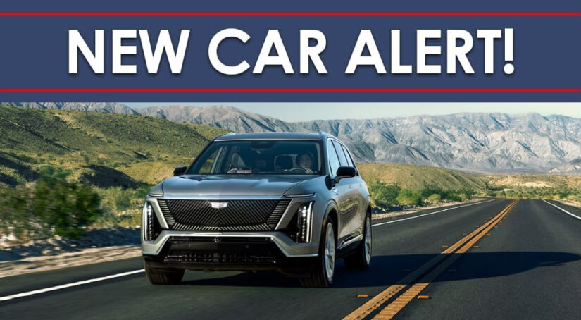 A silver 2026 Cadillac VISTIQ is shown under a New Car Alert banner.