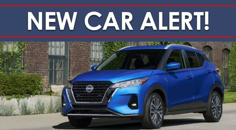 A blue 2025 Nissan Kicks Play is shown from the front at an angle under the "New Car Alert" banner.