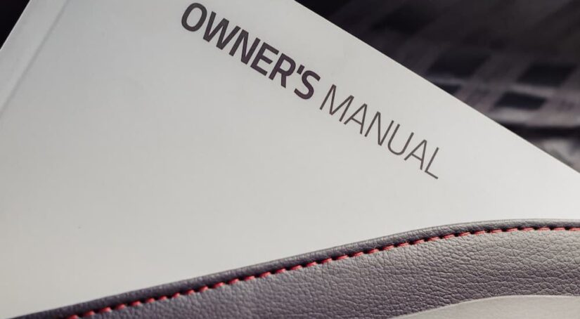 An owner's manual is shown.