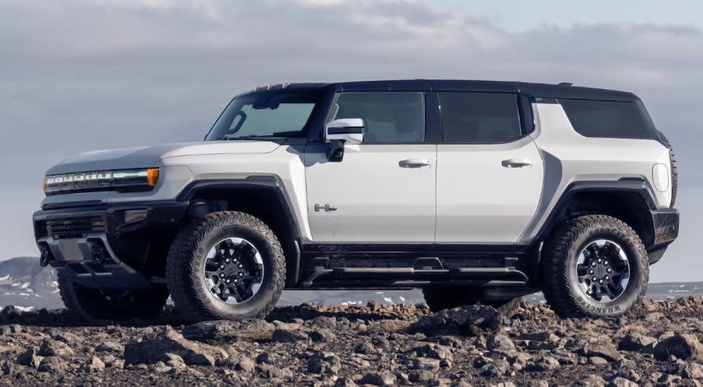 Side angle view of a white 2025 GMC Hummer EV.