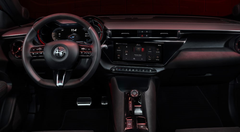 The black dash is shown in a 2025 Alfa Romeo Junior Elettrica.