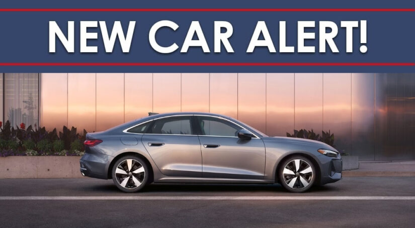 A silver 2025 Audi A5 is shown from the side under new car alert banner.