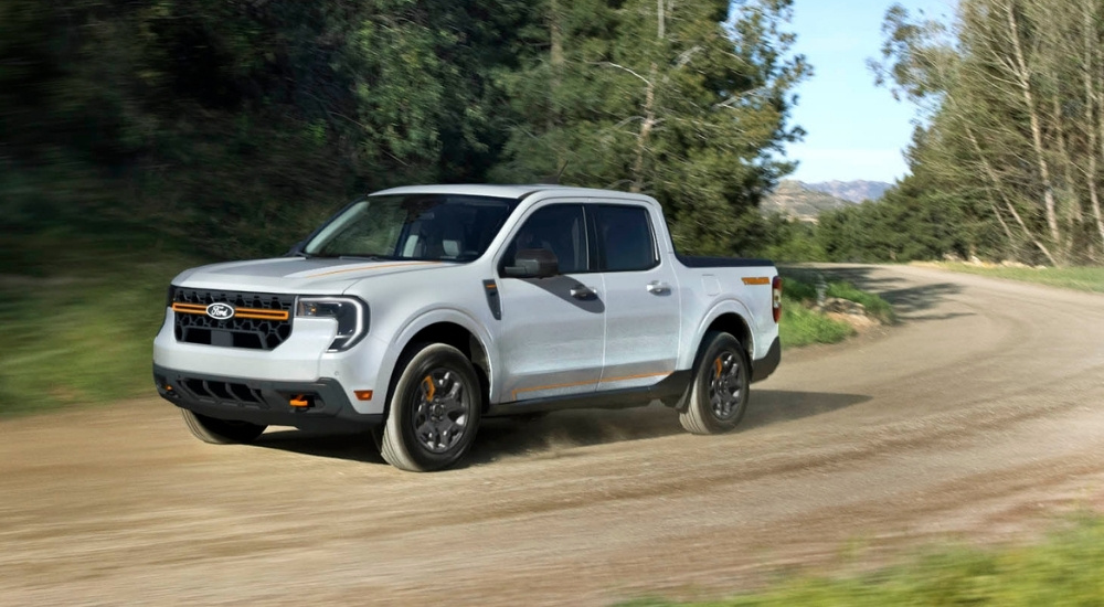 A white 2025 Ford Maverick Tremor is shown from the side.