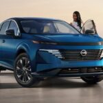 A person is shown entering a blue 2025 Nissan Murano Platinum.