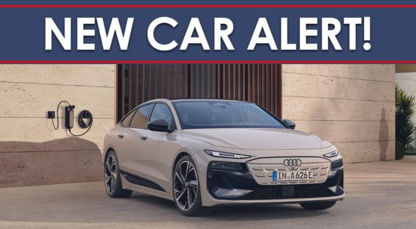 A tan 2026 Audi A6 Sportback e-tron is shown parked under a "New Car Alert" banner.