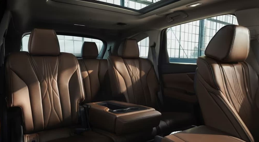 The brown rear seating area is shown in a 2025 Acura MDX.