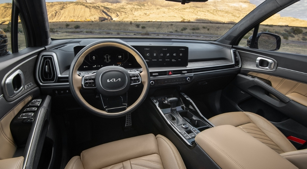 The tan interior of a 2025 Kia Sorento.