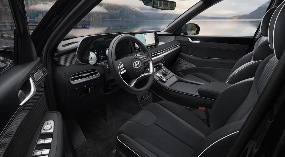 The black interior of a 2025 Hyundai Palisade.