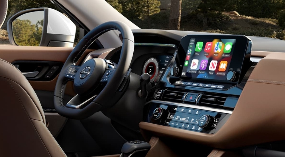 Infotainment screen in a 2025 Nissan Pathfinder for sale.
