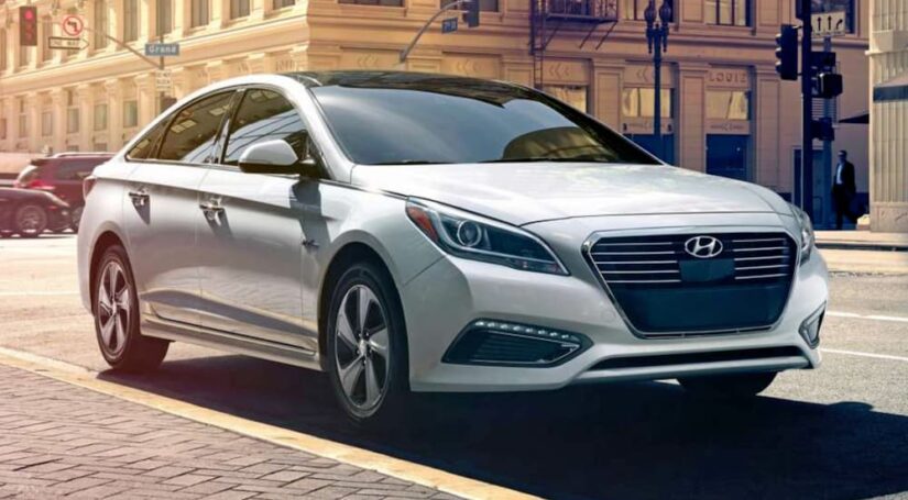 White 2016 Hyundai Sonata parked on a city street