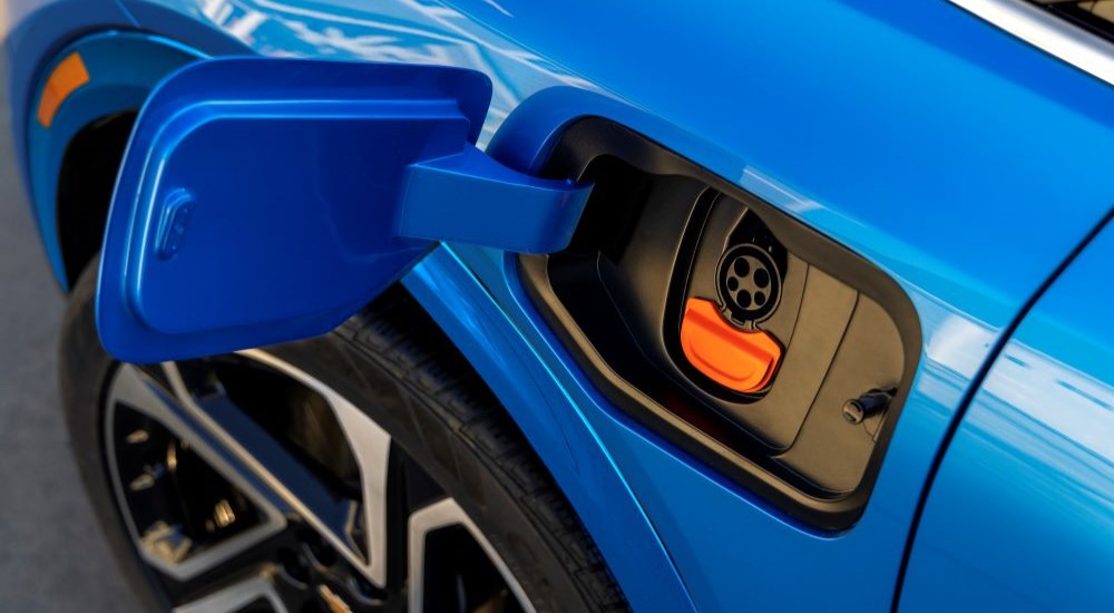 Charging port on a blue 2024 Chevy Equinox EV 3LT