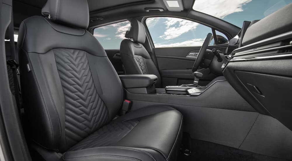 Black leather interior of a 2025 Kia Sportage