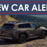 A bronze 2026 Toyota bZ Woodland from behind.