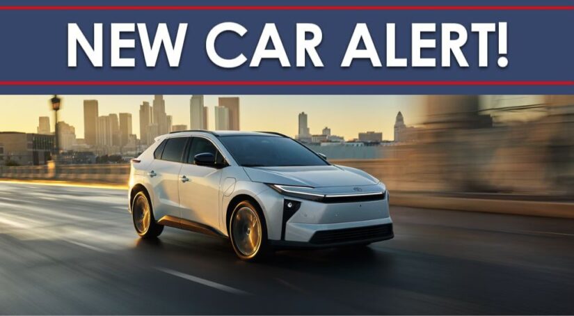 A "New Car Alert Banner" over a white 2026 Toyota bZ.