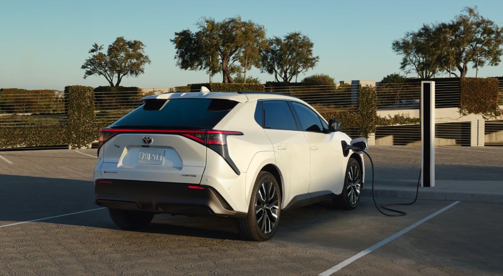 A white 2026 Toyota bZ is charging.