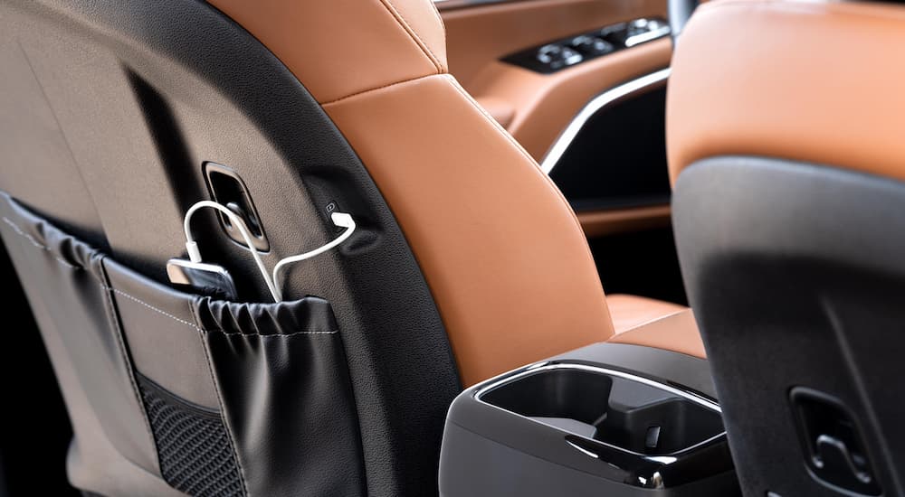 Brown leather seats in a 2025 Kia Telluride at a Kia dealer.