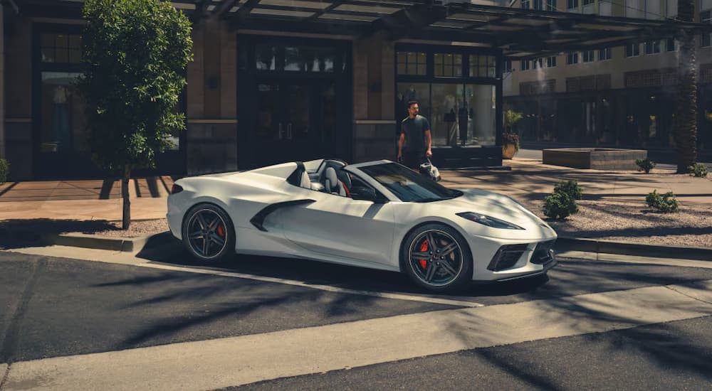 A white 2025 Chevy Corvette Stingray parked in a city