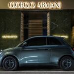 A 2025 Fiat 500e parked outside of Giorgio Armani