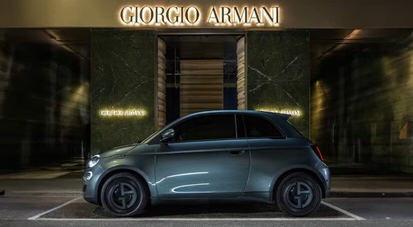 A 2025 Fiat 500e parked outside of Giorgio Armani