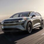 A 2025 Lucid Gravity driving down the road