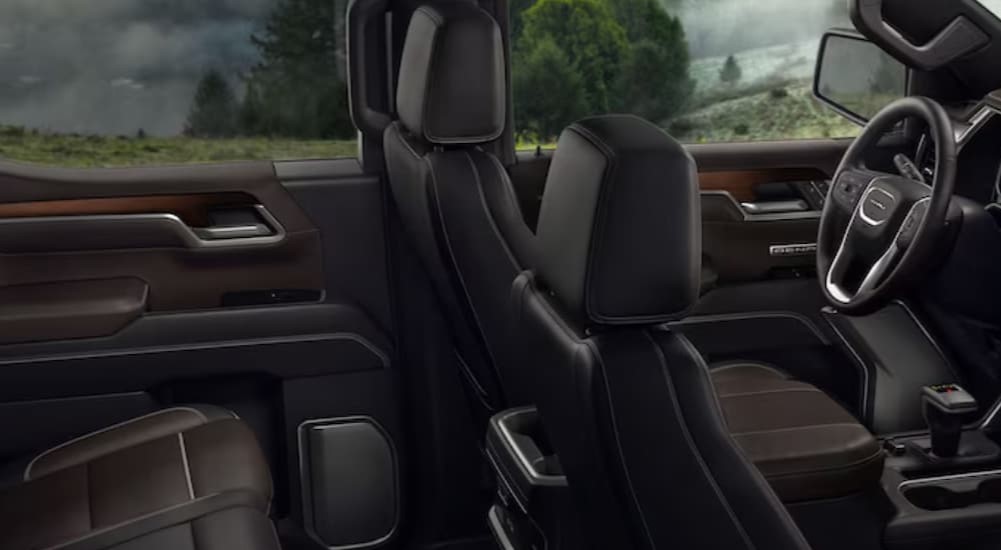 The black and brown interior in a 2025 GMC Sierra 1500.