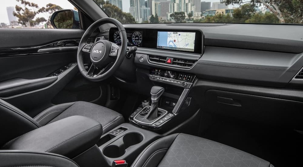 The black interior and dash in a 2025 Kia Seltos.