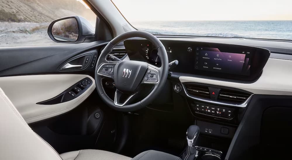 The black and white interior and dash in a 2026 Buick Encore GX.