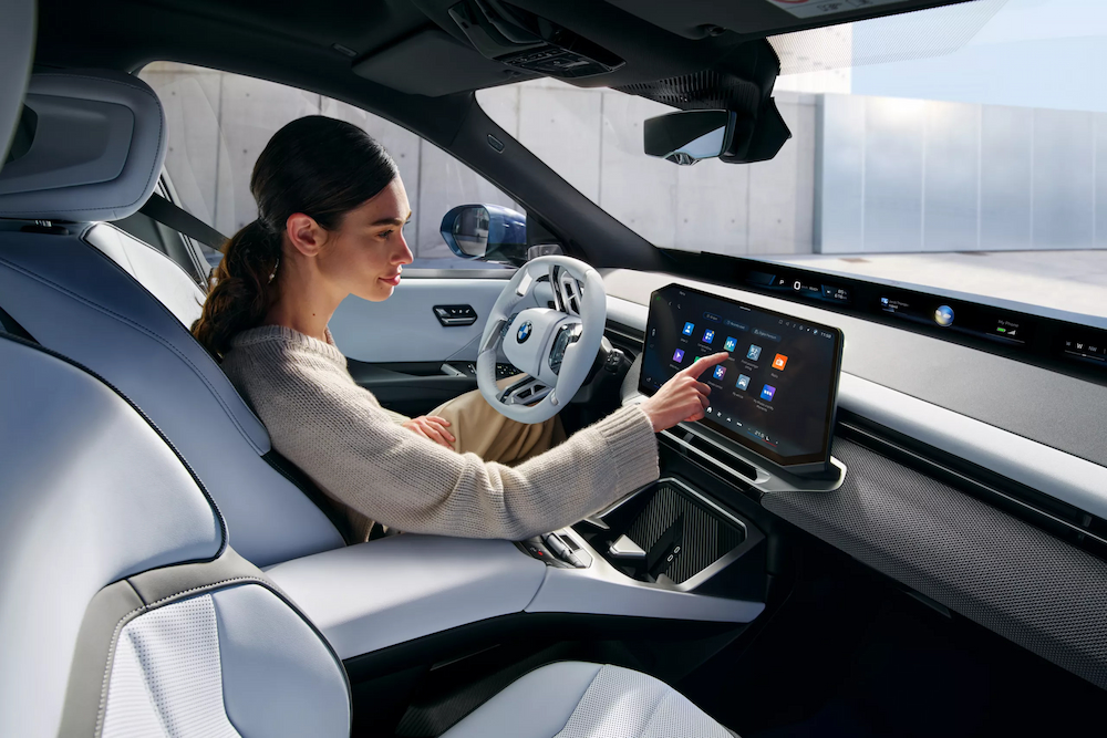 The gray and white interior and dash in a 2026 BMW iX3.