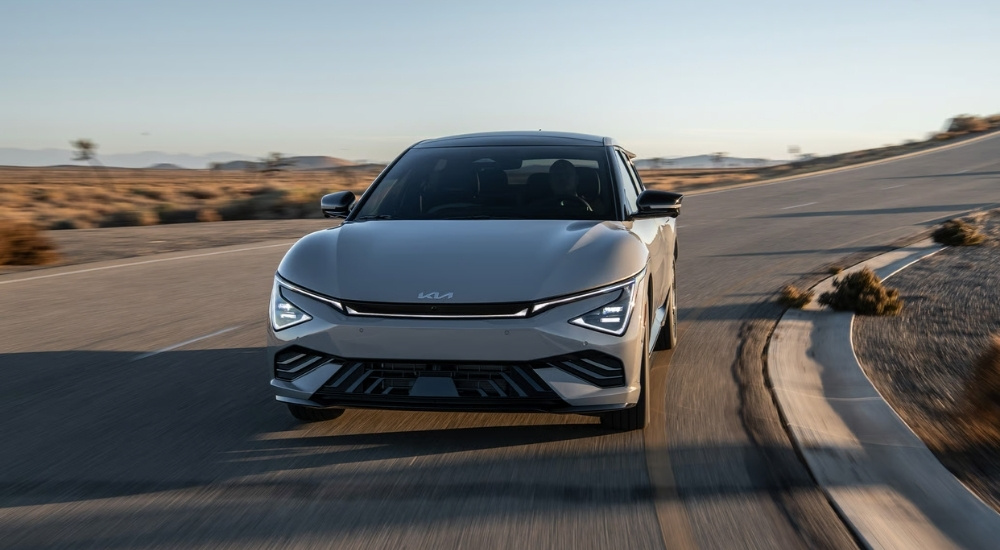 Silver 2025 Kia EV6 rounding a corner