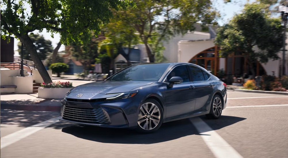Dark grey 2026 Toyota Camry parked at an angle.