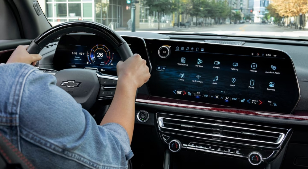 Person steering a 2026 Chevy Traverse