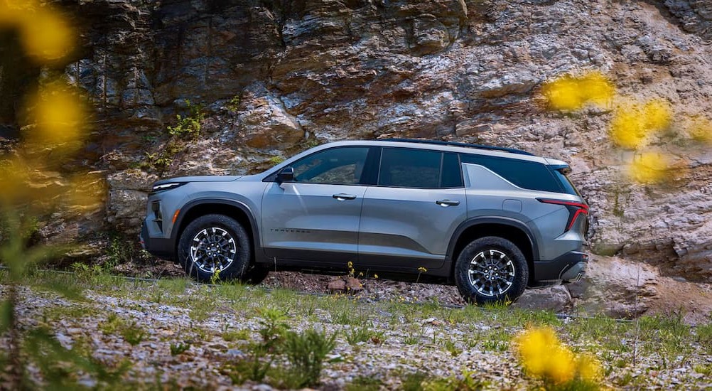 A silver 2026 Chevy Traverse off-road.