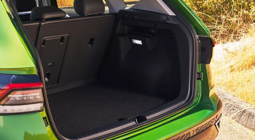 Rear cargo area in a green 2026 Volkswagen Taos.