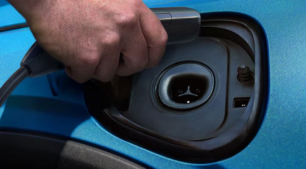 Charge port on a blue 2027 Chevy Bolt.