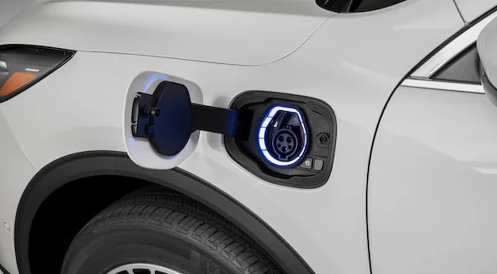 J1772 port on a white Ford vehicle.